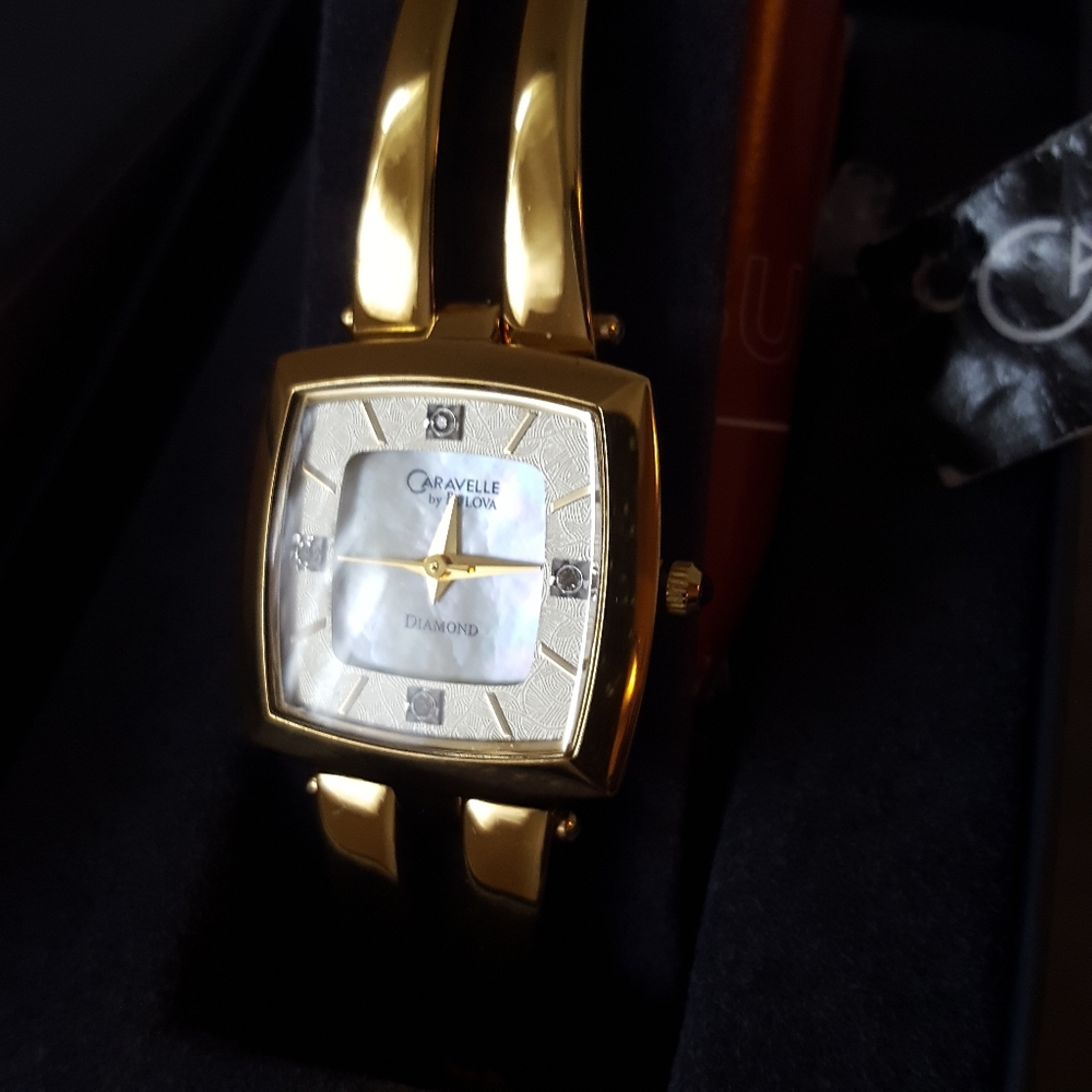 Caravelle gold tone watch